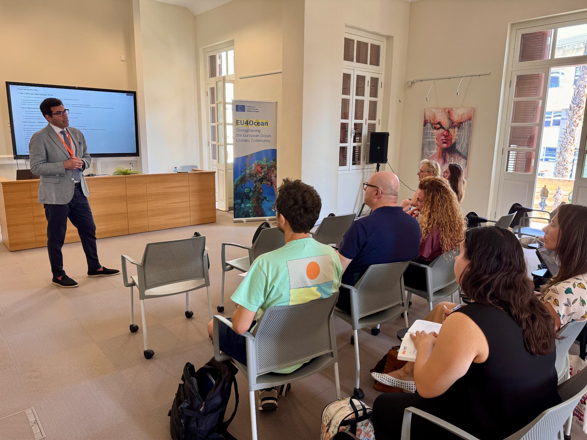 Odysseas Spyroglou introducing the design lab and the implementation plan.